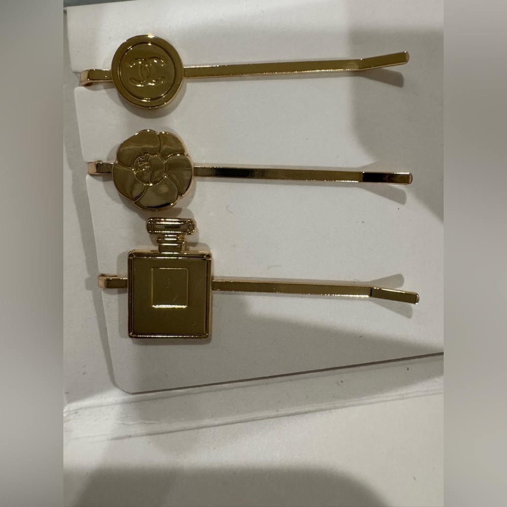 Fashion CC hair clips. Gold tone. 3 clips total from CC Beaute Line.